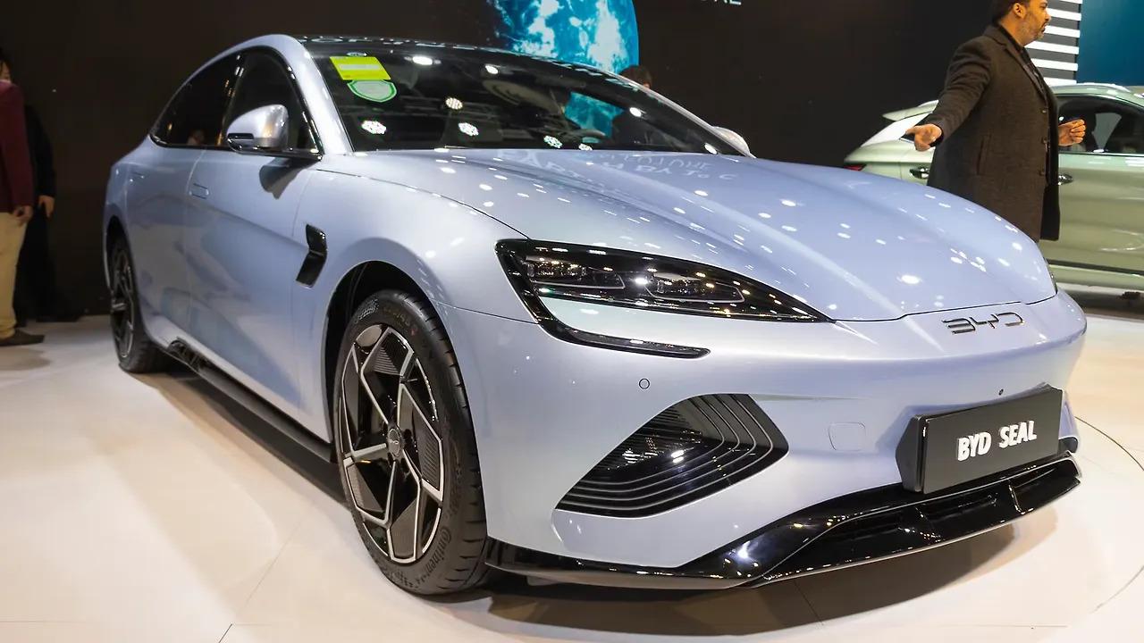 Hyundai IONIQ 5, Kia EV6, and BYD Seal parked side by side