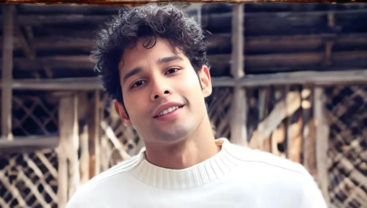Siddhant Chaturvedi speaking at a movie event in 2025