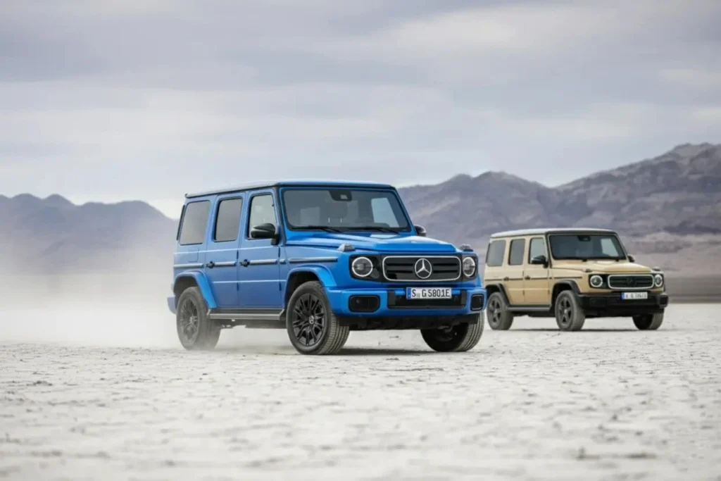 Mercedes Benz G Class side view with two SUVs parked together